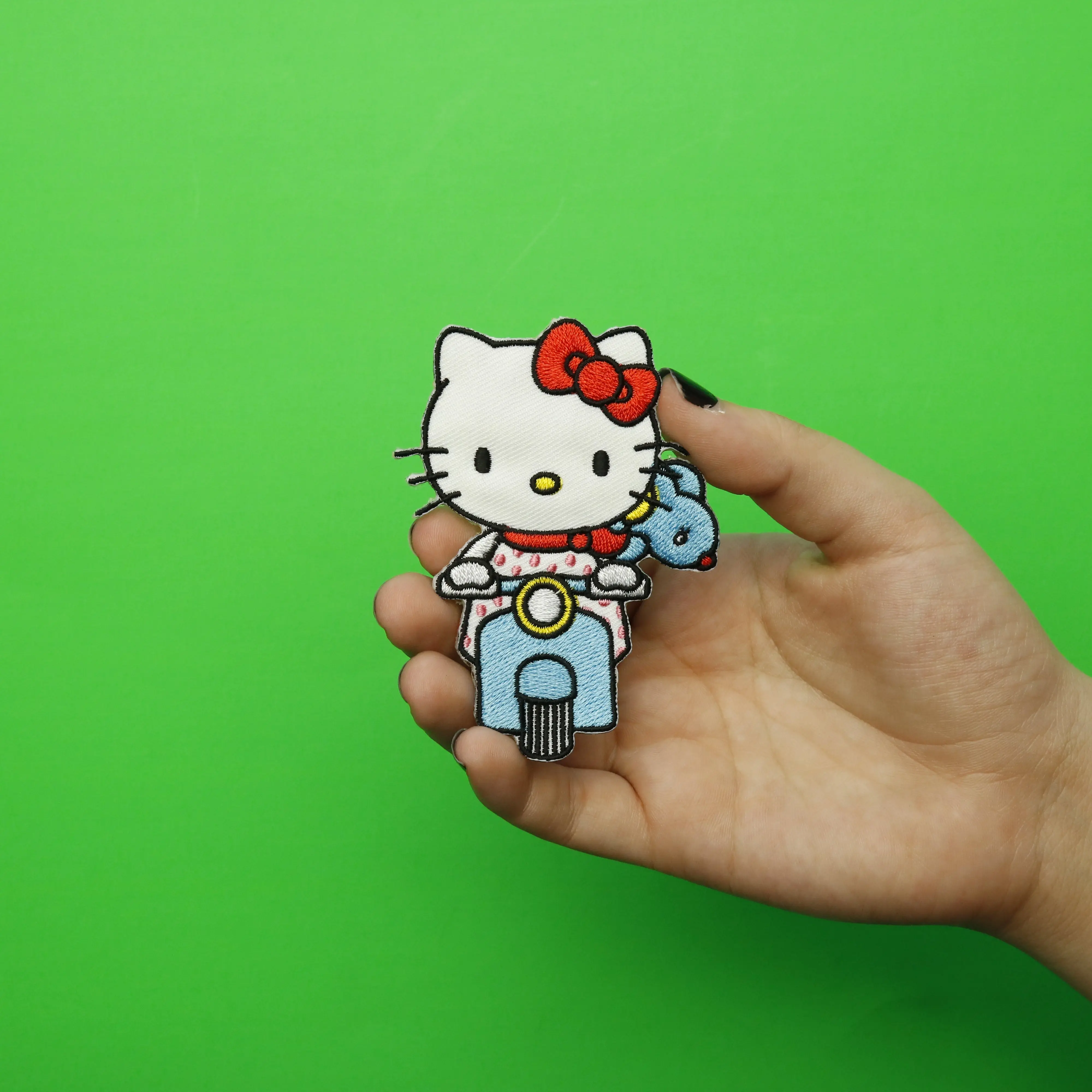 Hello Kitty Riding Blue Scooter Iron On Embroidered Patch - Image 2